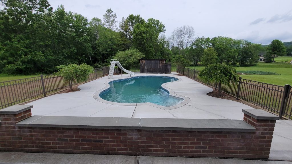 A concrete pool area